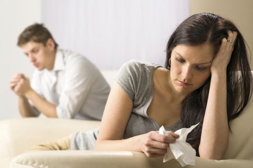 Young couple mad at each other in their home